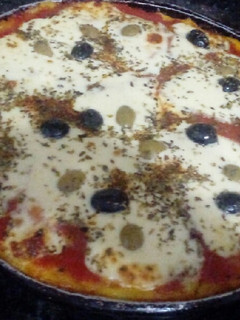 Una foto de Pizza de polenta
