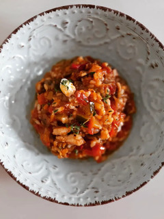 Una foto de Arroz meloso de pisto y sardinas