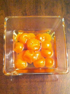Una foto de Kumquats en almíbar