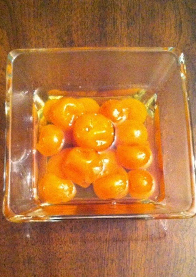 Una foto de Kumquats en almíbar