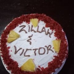A picture of Cake Challenge - Red velvet with pineapple pieces.