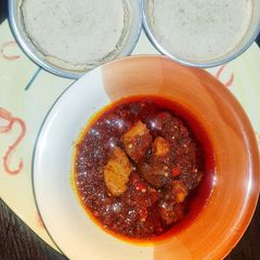 A picture of Ekuru (white moin moin) and ata dindin.