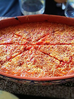 Una foto de Pastel de patata con tomate y queso