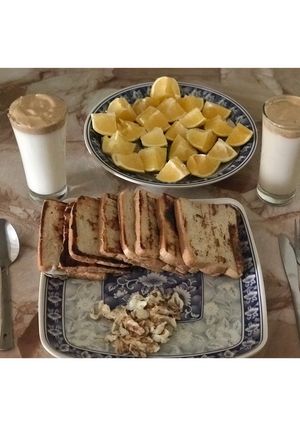 A picture of French toast and Dalgano coffee.