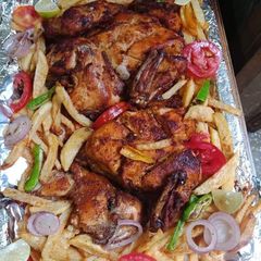 A picture of Oven roast with vegetables.
