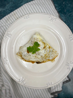 Una foto de Omelette de claras de huevo con champiñones
