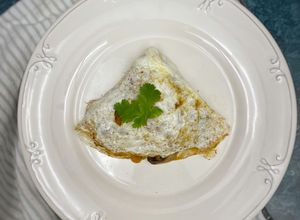 Una foto de Omelette de claras de huevo con champiñones