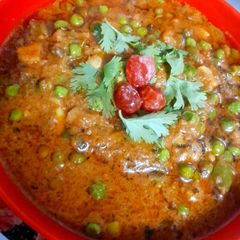 A picture of Mushroom Matar malai sabji.