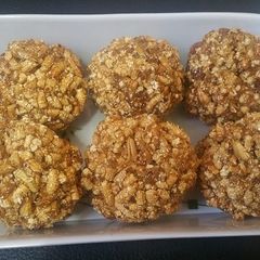 Pelalu / Parched Grain/Fried paddy Laddu A picture of Pelalu / Parched Grain/Fried paddy Laddu.