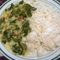 A picture of Spinach with turnip and red pepper.