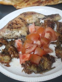 Una foto de Contramuslos de pollo con patatas al grill doble