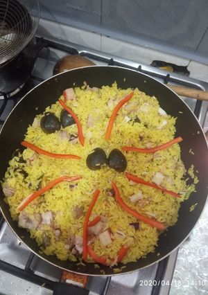 Una foto de Paella