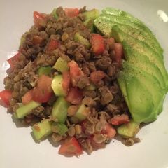 A picture of Lentil salad with tomatoes and avocado 😋😋.