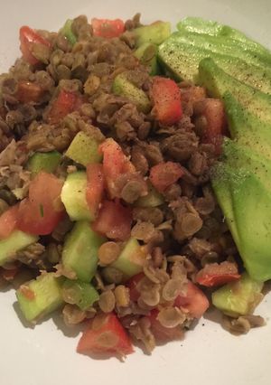 A picture of Lentil salad with tomatoes and avocado 😋😋.