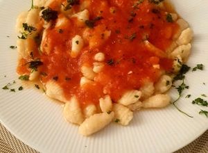 Una foto de Ñoquis caseros de patatas