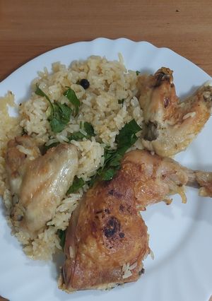 A picture of Lemony Baked Chicken with Rice.