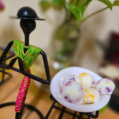 A picture of Pomegranate Mosambi Frozen Yoghurt Bites.