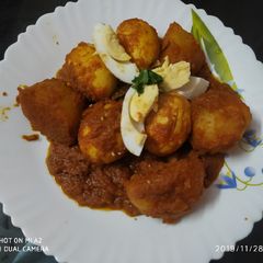 A picture of Dry egg potato masala.