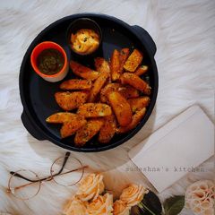 A picture of Garlic Potato Wedges.