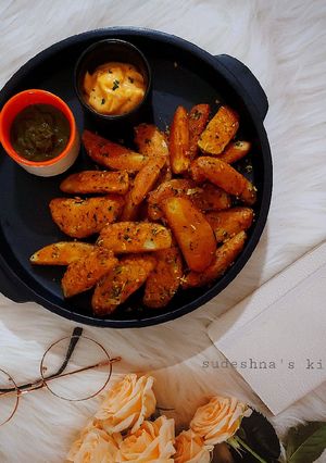 A picture of Garlic Potato Wedges.