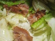 A picture of fried cabbage and bacon