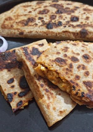A picture of Leftover roti sandwich for breakfast.