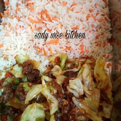 A picture of Carrot rice with vegetable soup.