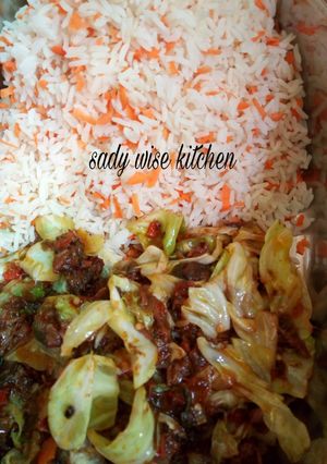 A picture of Carrot rice with vegetable soup.