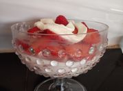 Una foto de frutilla con crema