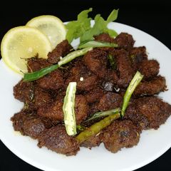 A picture of Tala hua gosht Hyderabadi.