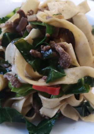 A picture of Fusion tagliatelle, steak mince, spring greens Asian style.
