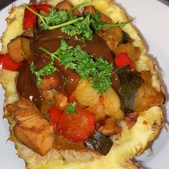 A picture of Pineapple Chicken with Coconutrice.