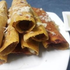 A picture of Cheesy shami kabab rolls.