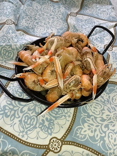 Una foto de Cigalitas de morralla encebolladas