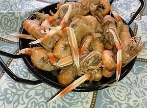 Una foto de Cigalitas de morralla encebolladas