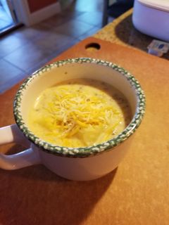 A picture of Cheesy potato sausage soup.