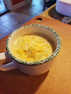 A picture of Cheesy potato sausage soup.