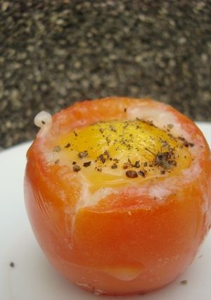 A picture of Baked Eggs in a tomato.