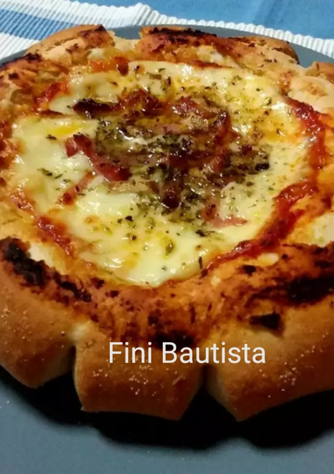 Una foto de Pizza de queso provolone