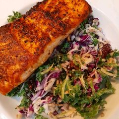 A picture of Grilled Salmon with chopped kale salad.