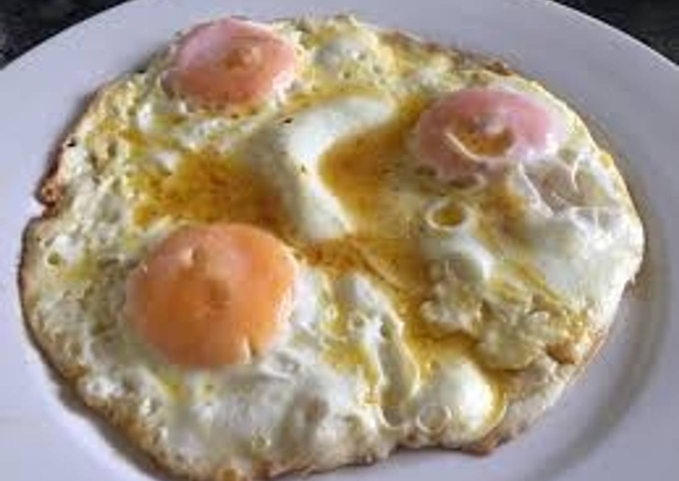 Runny fried eggs