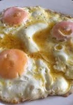 A picture of Runny fried eggs.
