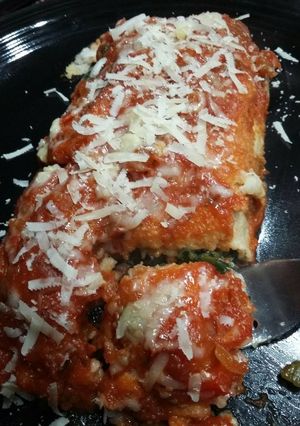 Una foto de Canelones de espinaca y jamón