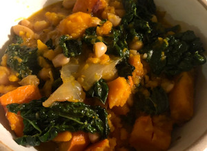 A picture of Slow herby squash and beans - vegan.