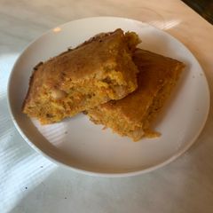 A picture of Carrot Cake with Walnuts and Cinnamon.