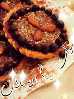 صورة لوصفة تارتولات الشكلاطة الفاخرة بحشو الموز ولآ أرووووع 👌😜