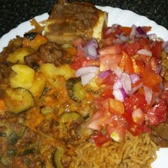 A picture of Beef potatoe stew and kachumbari.