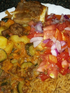 A picture of Beef potatoe stew and kachumbari.