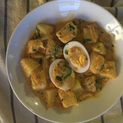 A picture of Potatoes and Hard Boiled eggs in Yogurt Sauce.