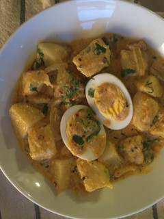 A picture of Potatoes and Hard Boiled eggs in Yogurt Sauce.